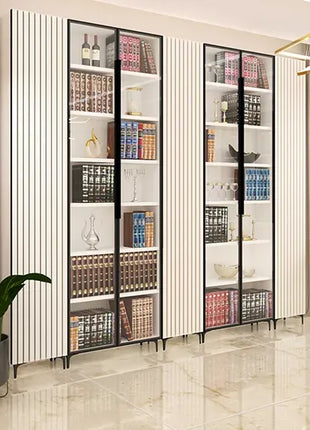 Modern interior with glass display cabinets and decorative plants.