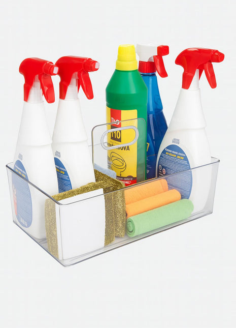 Clear storage bin with cleaning supplies including spray bottles and cloths on a white background