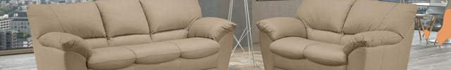 Trani sofa set in beige leather in a modern high-rise living room