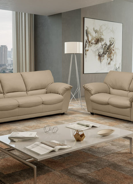 Trani sofa set in beige leather in a modern high-rise living room