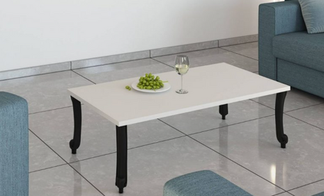 Haven Oak rectangular coffee table with warm natural wood finish and black sculptural legs